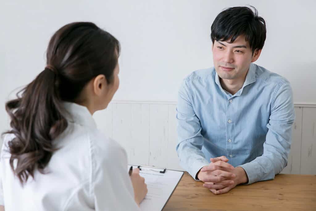 practitioner talking to a patient