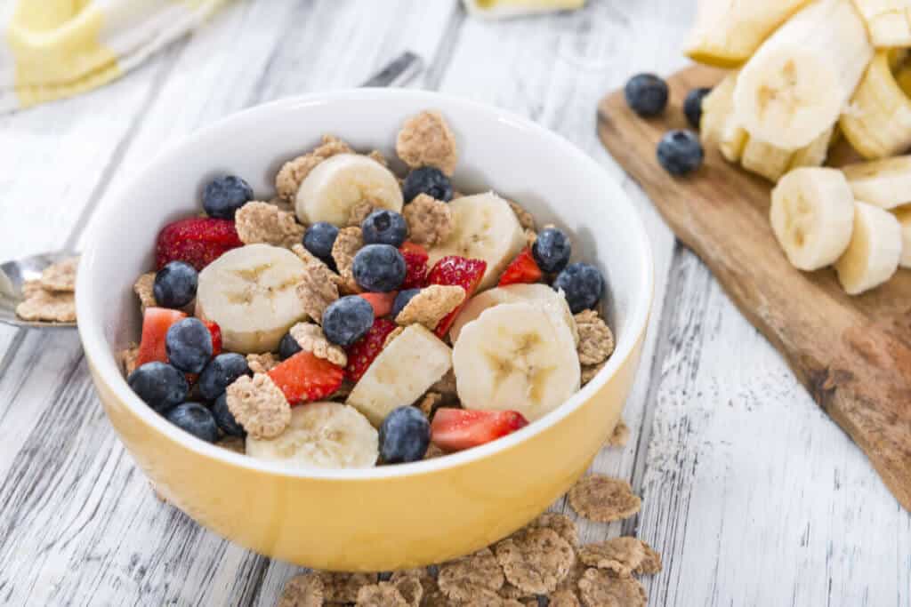bowl with banana, berries, and oats