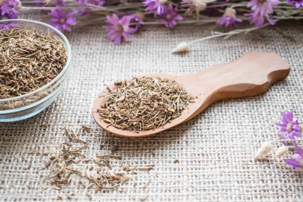 valerian root extract on a wooden spoon