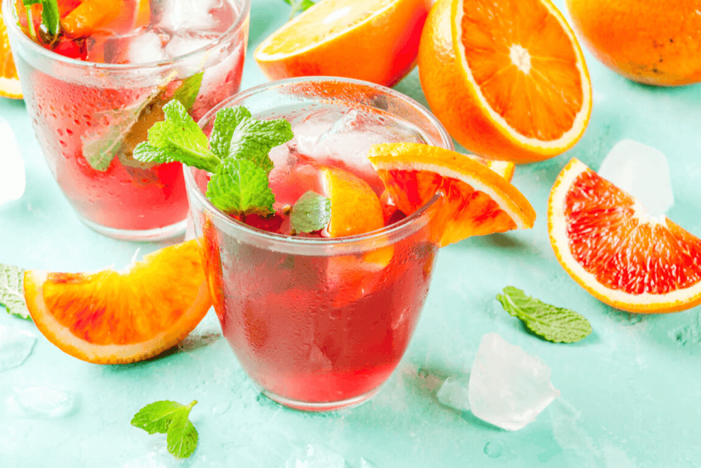 sugar-sweetened acidic drink with orange slices