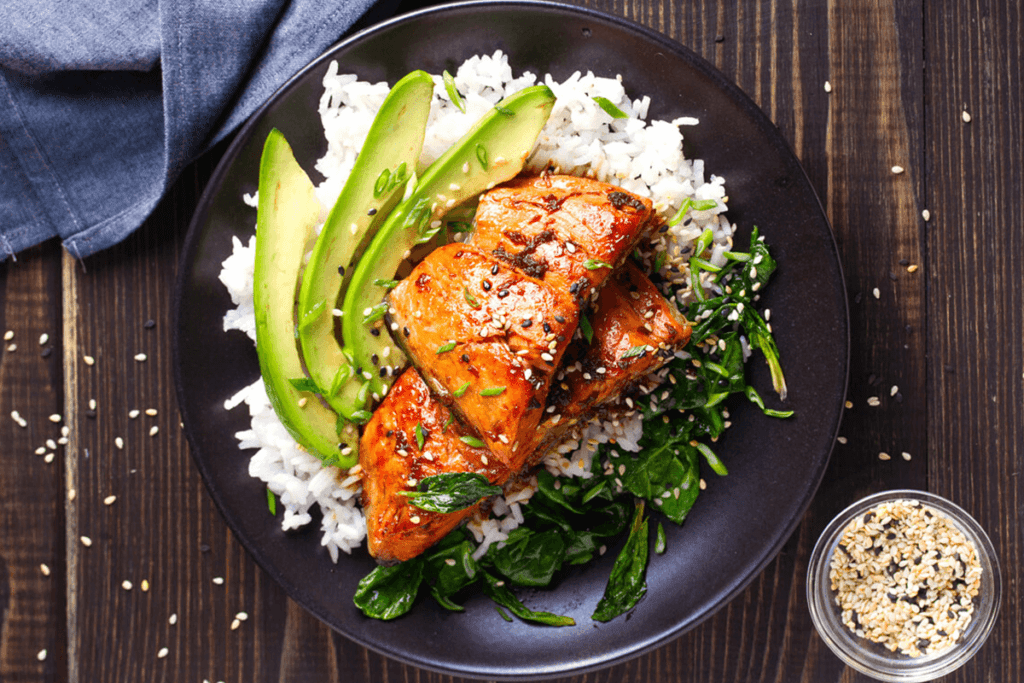 dish with rice, avocado, and fish