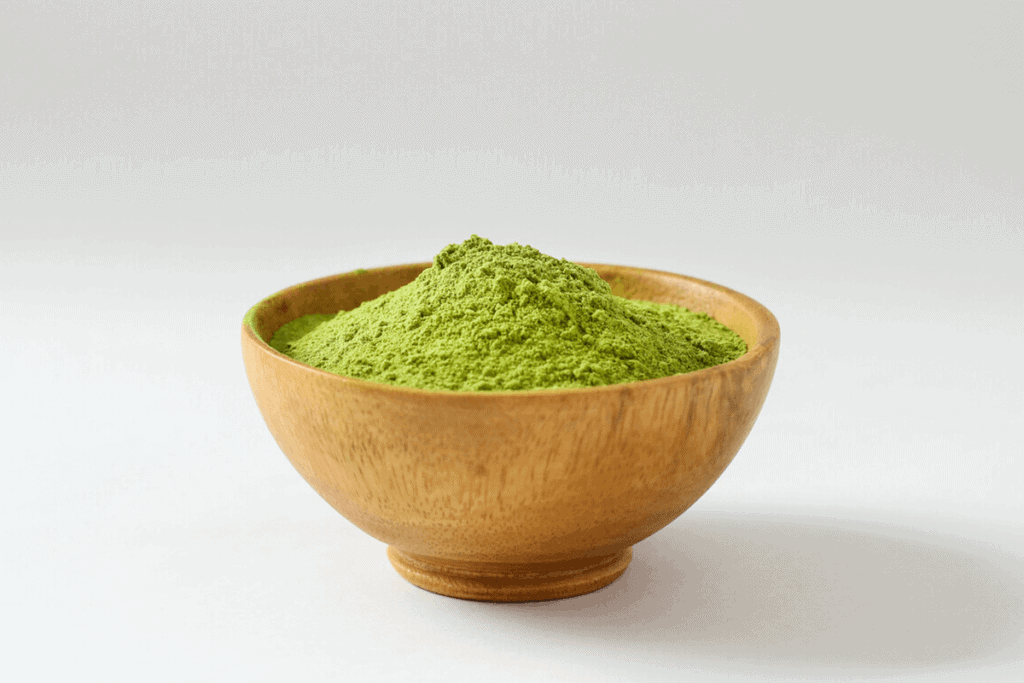 green tea extract in a wooden bowl