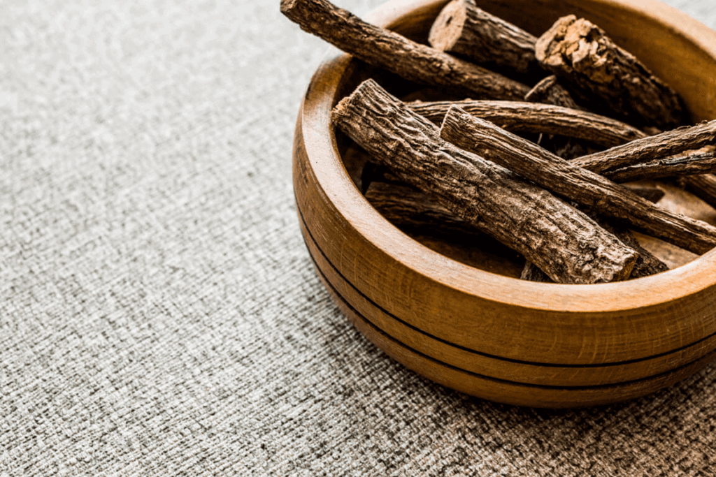 licorice root in a wooden bowl
