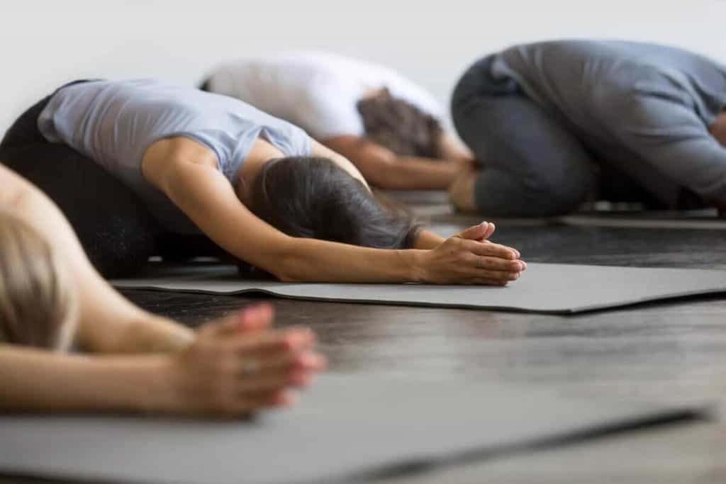 Image of people doing yoga