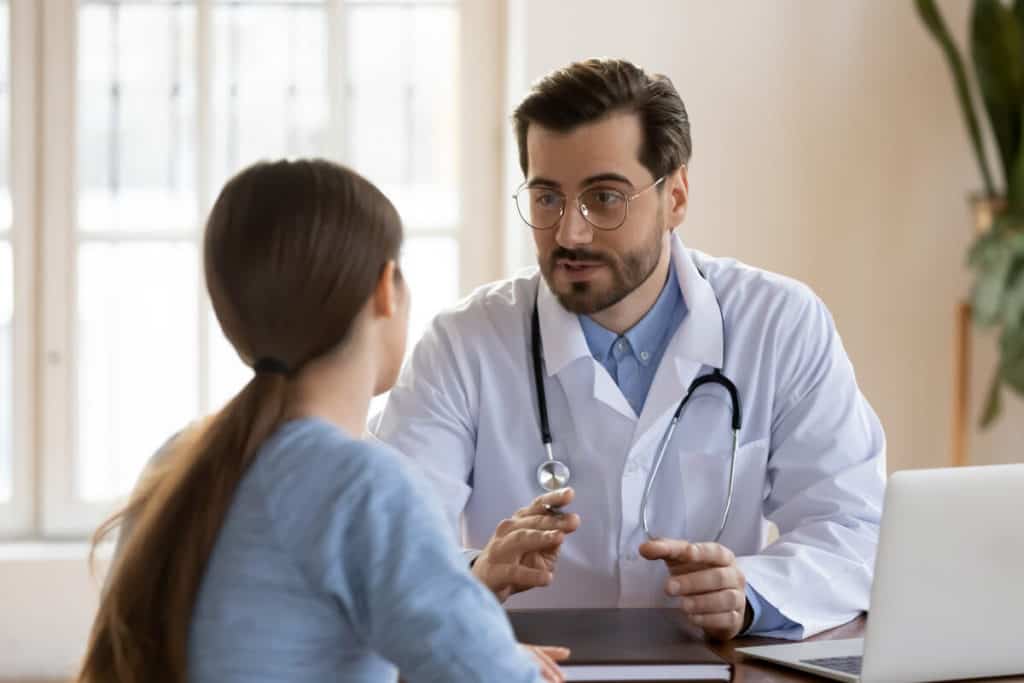 Image of doctor talking with a patient