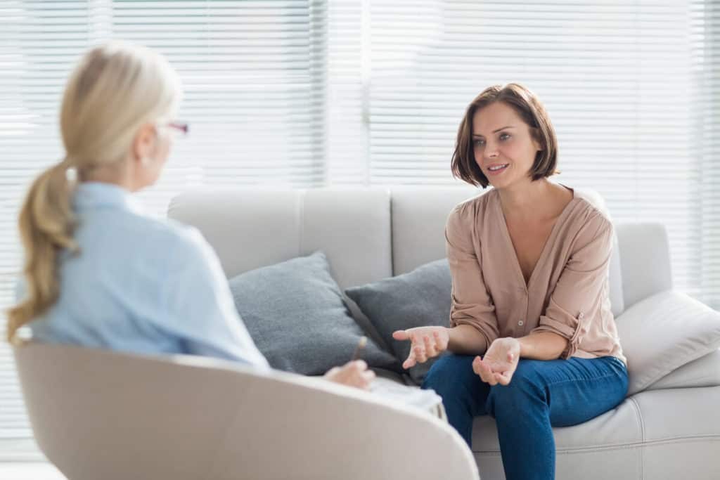 Image of woman consulting with a doctor