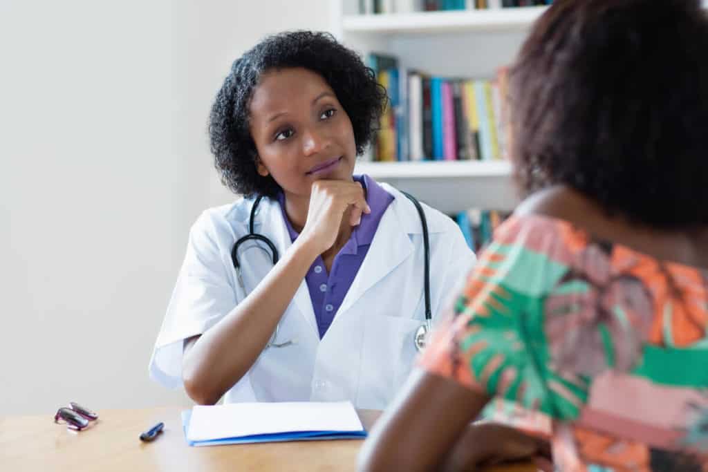 Image of doctor consulting with a patient