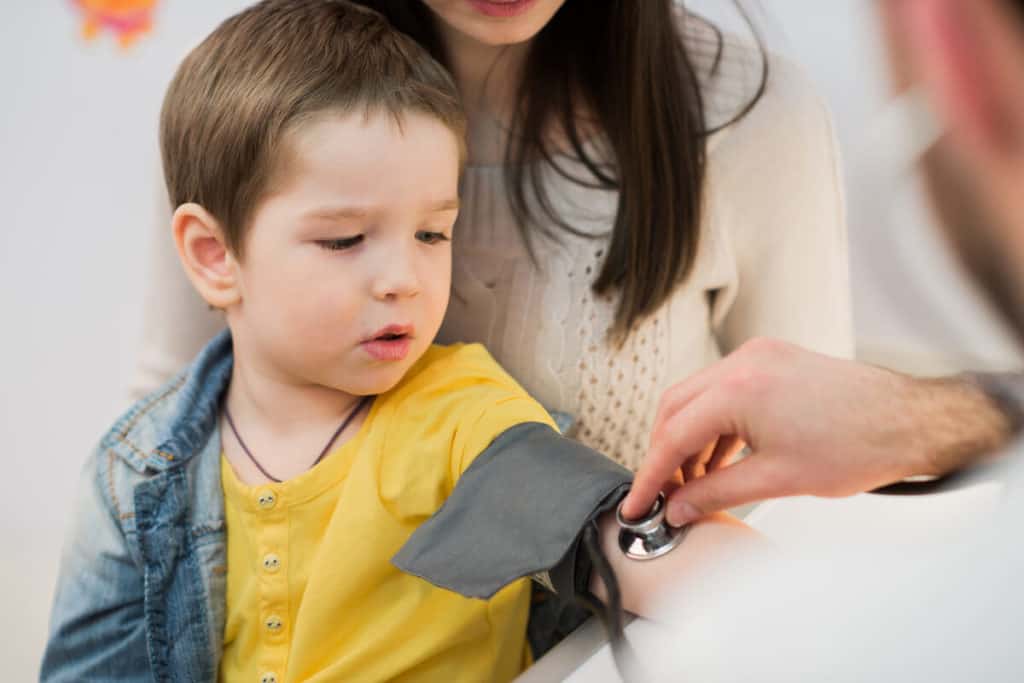 Child getting his heartbeat taken