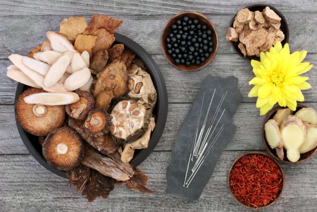 A spread of traditional Chinese herbs and TMC treatments