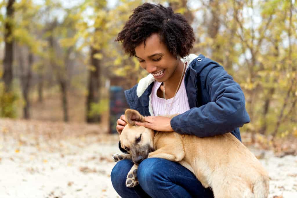 Person holding a dog