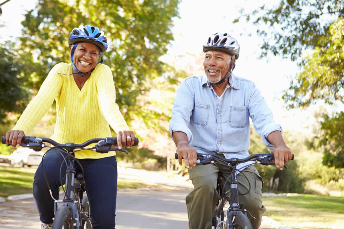 Two adults riding bicycles