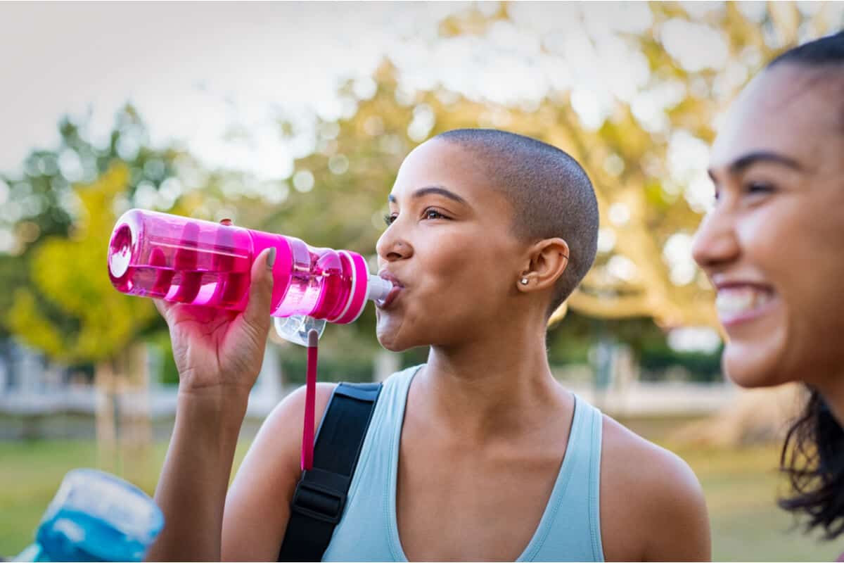 hydration woman drinking from water bottle