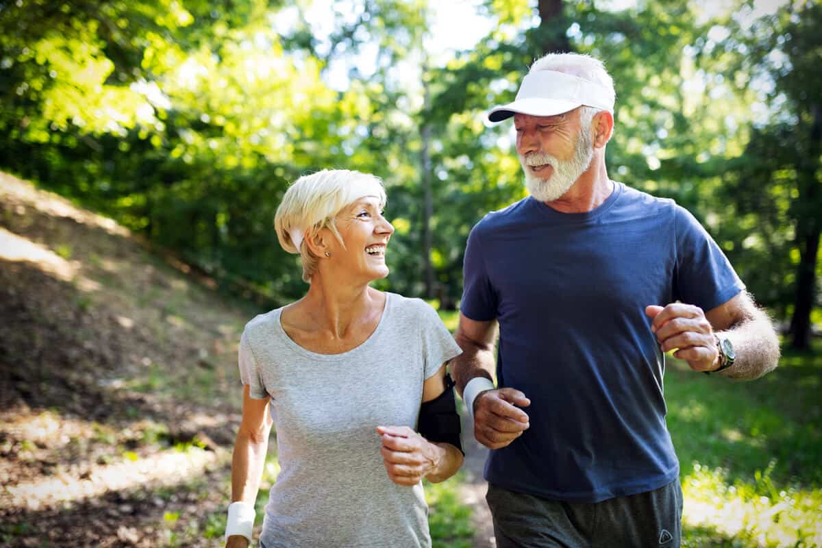 natural remedies for heartburn older couple running outdoors together