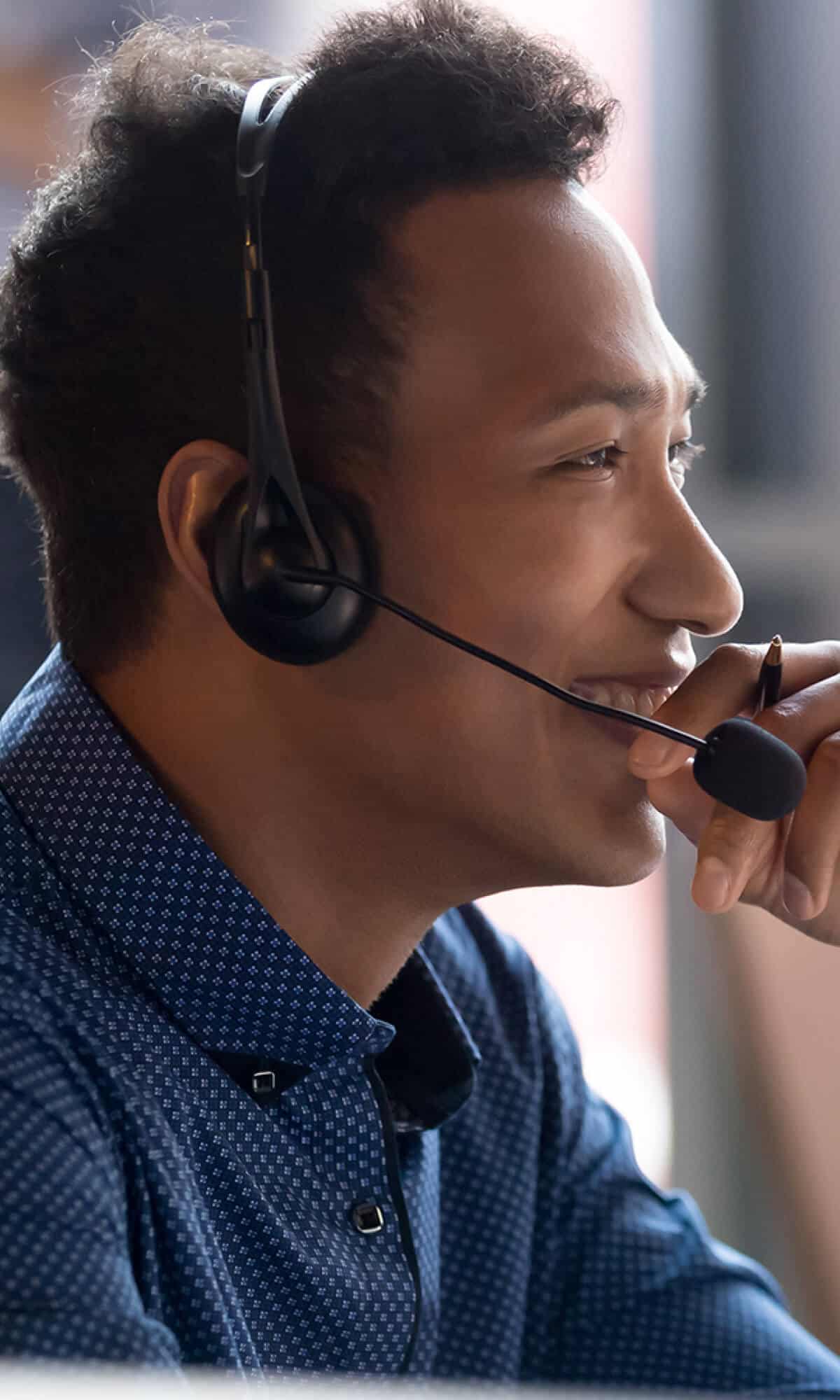 a smiling customer support person with a headset