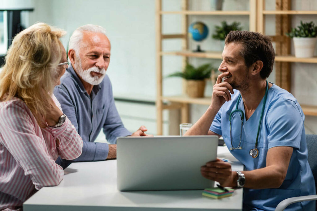 Patients and healthcare provider communicating with each other. 
