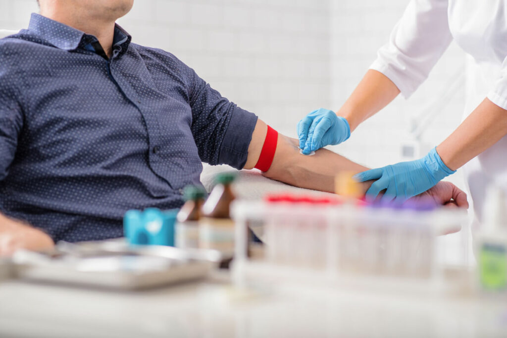 practitioner doing a blood test