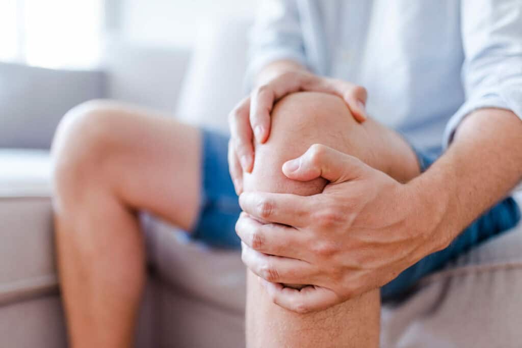 person holding their knee